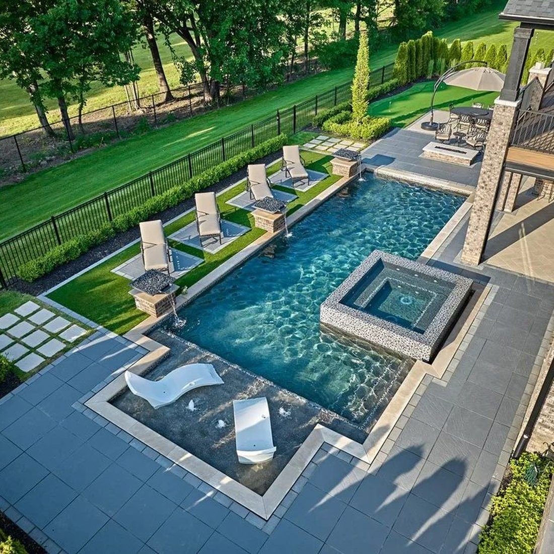 Pool with spa and loungers