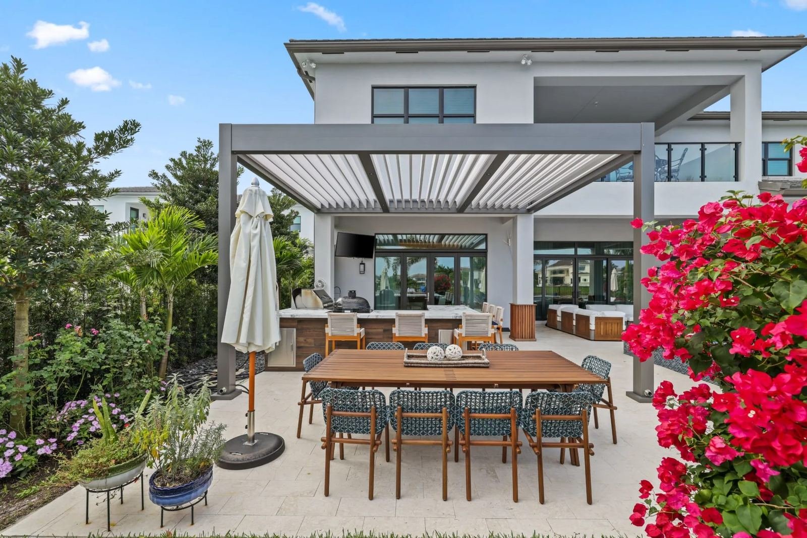 Pergola over an outdoor dining terrace