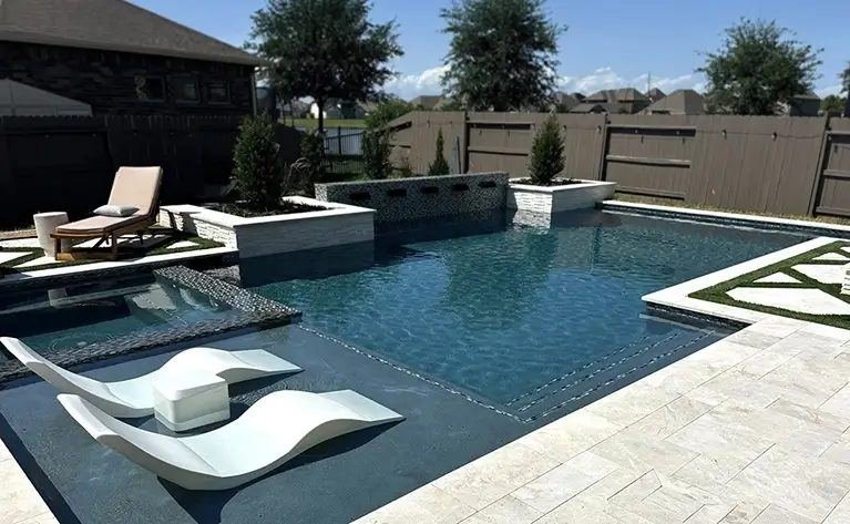Pool deck with sun loungers