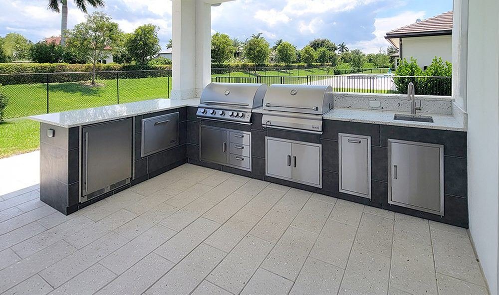 Outdoor kitchen counter with built-in grills